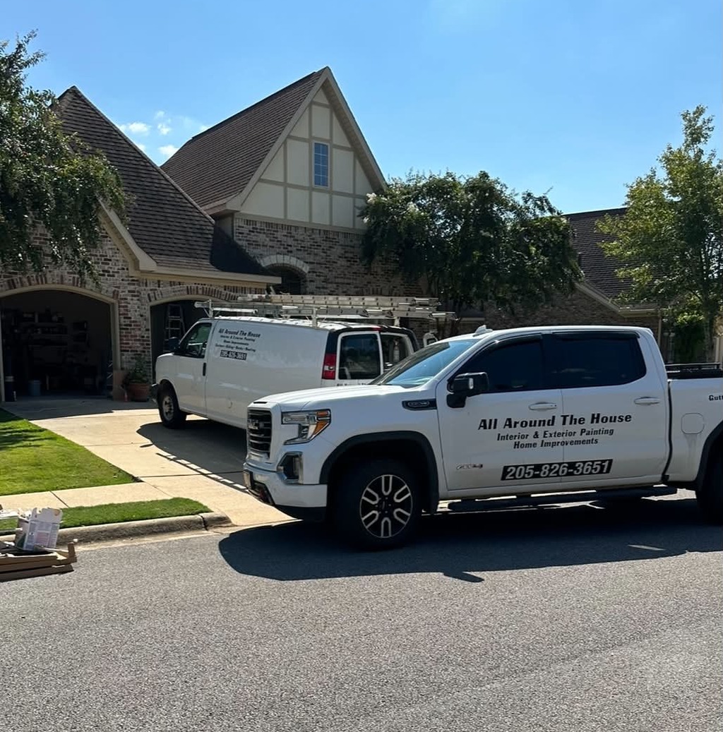 Home repair contractor truck parked outside a residential property