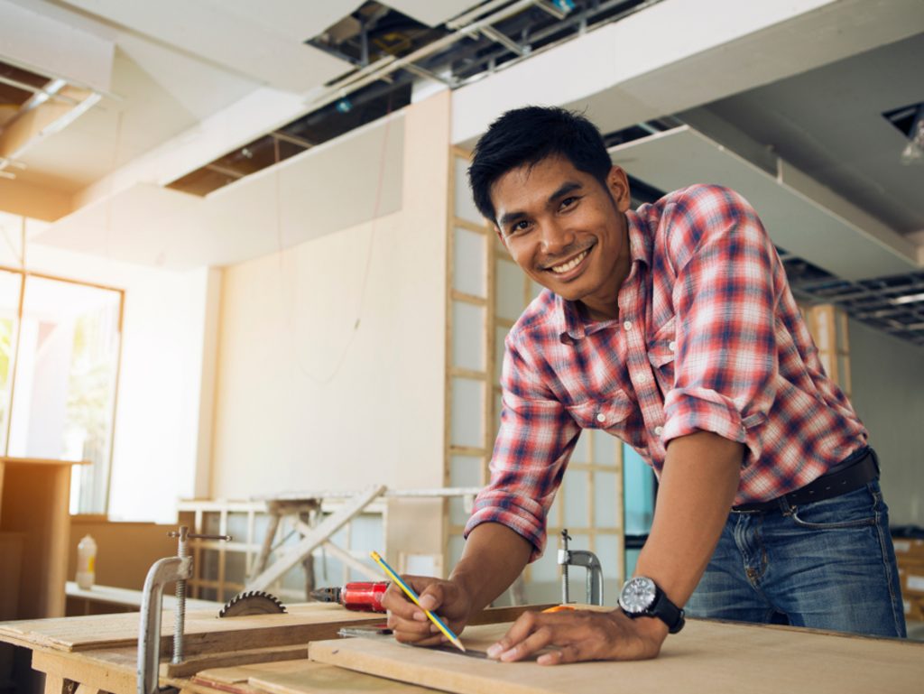 Home flipper working and smiling