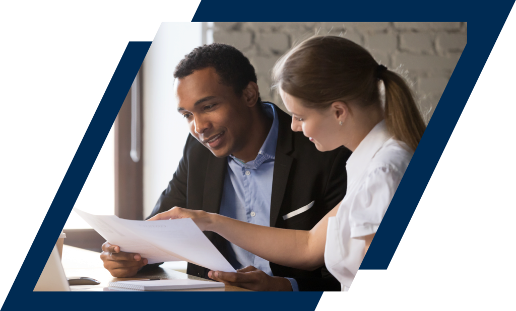woman and man reviewing paperwork