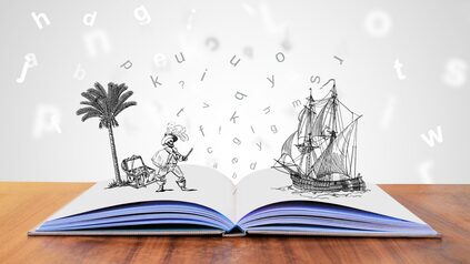 Collage - geöffnetes Buch mit gezeichneter Story